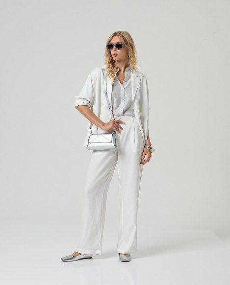 Pantalone bianco dettaglio tasche Surkana