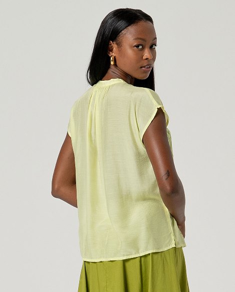 Camicia smanicata ricamo Surkana