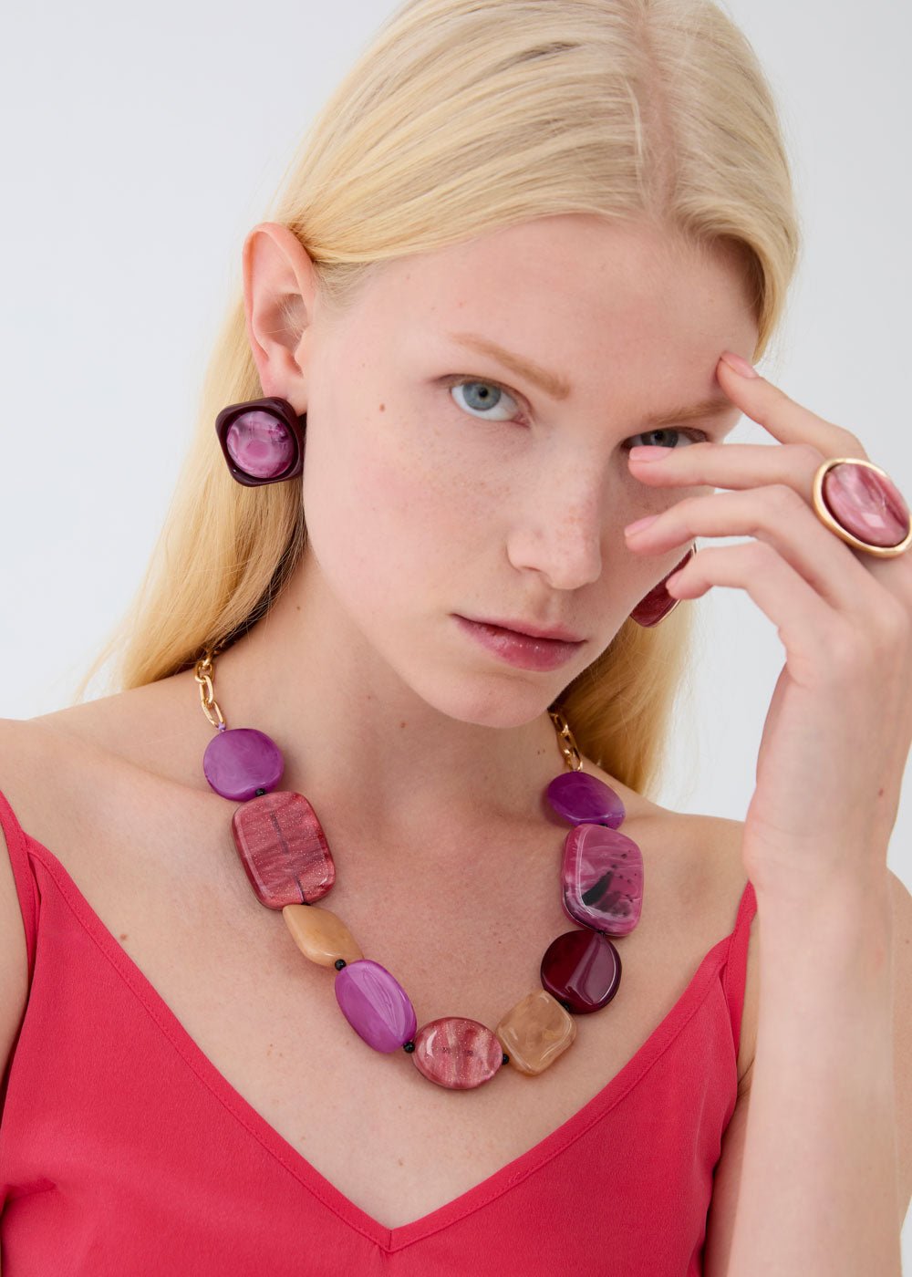 Collana girocollo in resina viola oro