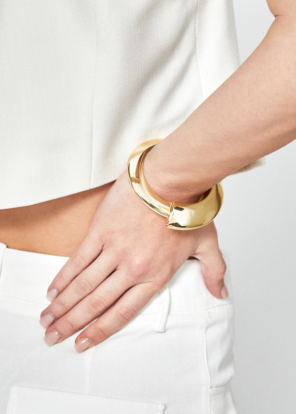 Bracciale rigido molla irregolare oro