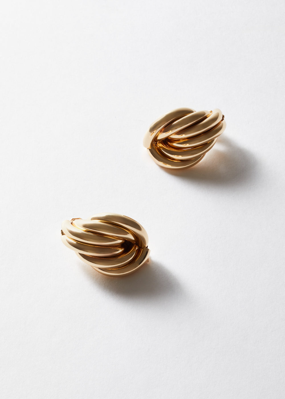 Orecchini clip intrecciati oro