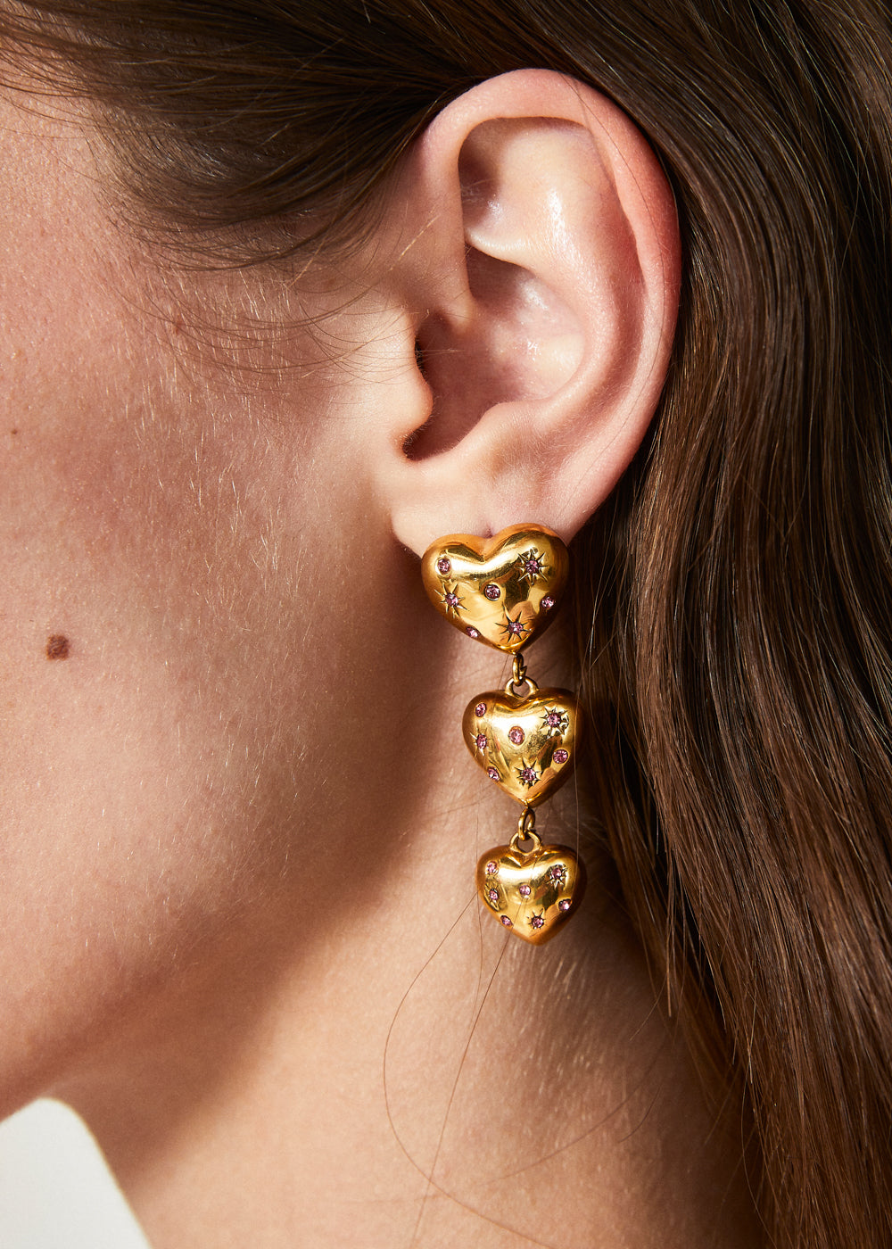 Orecchini lunghi cuori pietre rosa