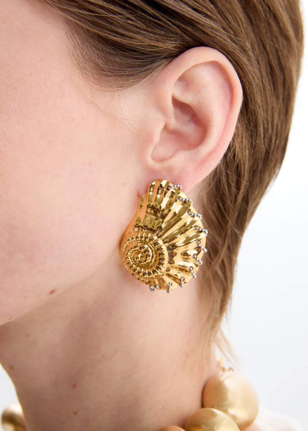 Orecchini SHELL over oro